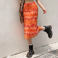 Chic Over-The-Knee Orange Floral Skirt